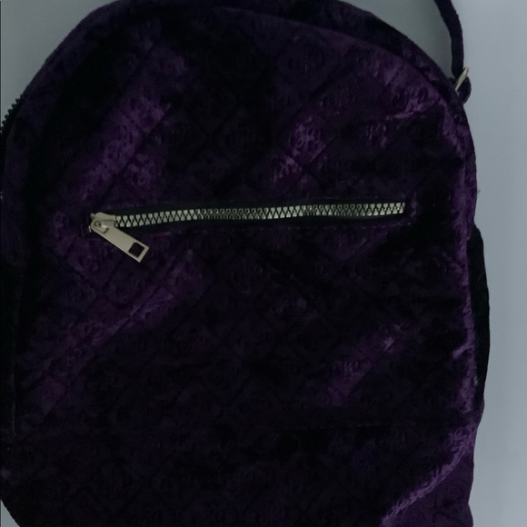 Women’s used pack back color purple size medium